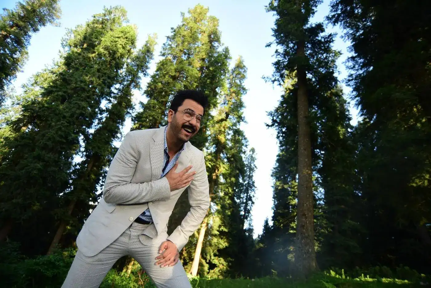 Brand Axis actor among pines